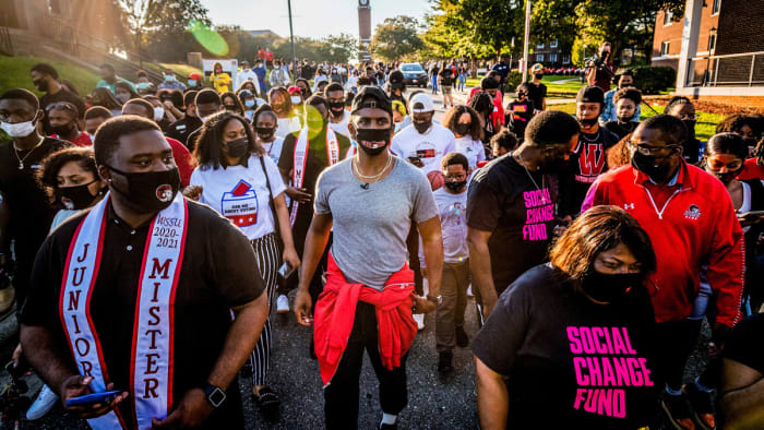 Paul (center) led students in his home state on a march to vote.
